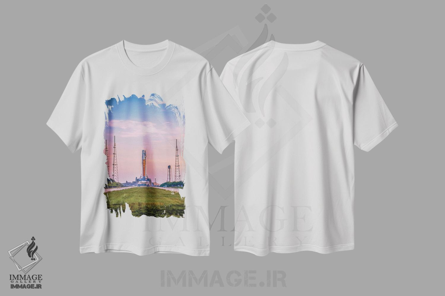تیشرت طرح دار موشک آرتیمیس SLS ناسا بر سکوی پرتاب هنگام طلوع، مدیوم اثر الکس جی پرز | immage.ir