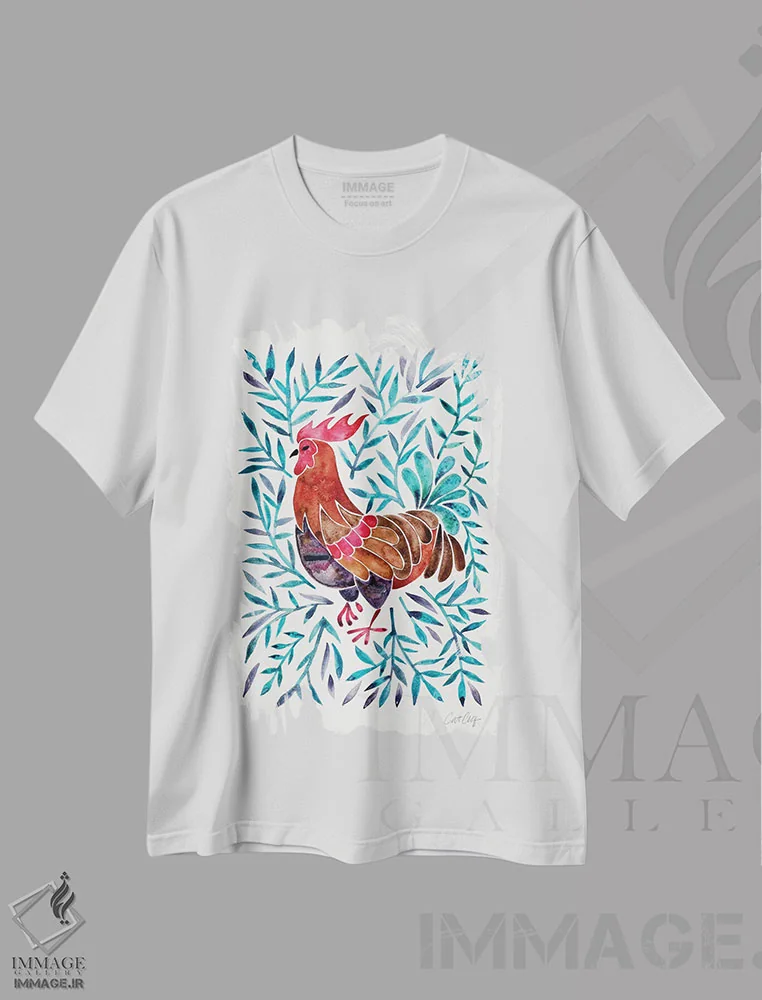 تیشرت سفید طرح دار خروس با برگ های سبز، تزئینی اثر کت کوکیلت | فروشگاه ایماژ