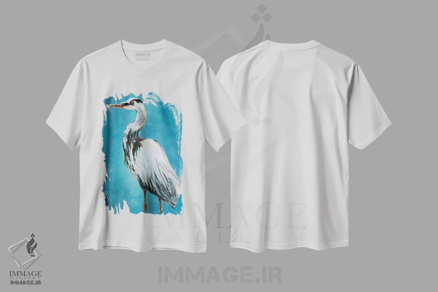 تیشرت سفید طرح دار حواصیل آبی بزرگ II، دکور ساحلی اثر کارول رابینسون | فروشگاه ایماژ