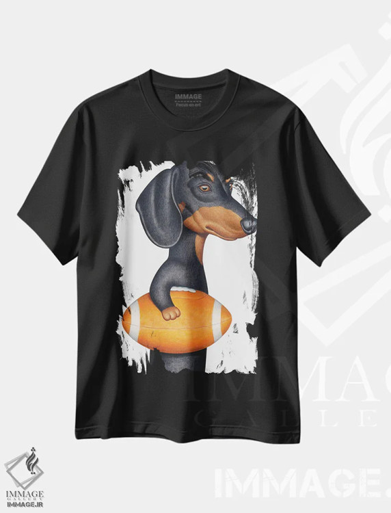 تیشرت مشکی طرح دار داشهوند سیاه با توپ فوتبال نارنجی، تزئینی اثر دنی گوردون | immage.ir
