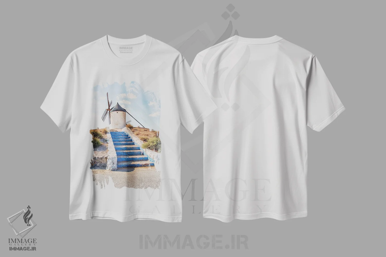 تیشرت سفید طرح دار آسیاب بادی در لا مانچا، مدیوم اثر مانجیک پیکچرز | فروشگاه ایماژ