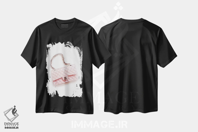 تیشرت مشکی طرح دار کیف صورتی دوخته شده که بر زمین قرار گرفته است، تزئینی اثر آماندا گرینوود | فروشگاه ایماژ