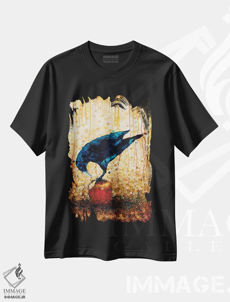 تیشرت مشکی طرح دار کلاغ و سیب، تزئینی اثر هایدی بارنت | immage.ir