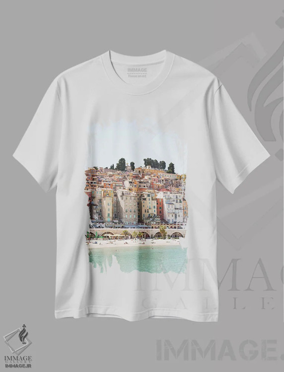 تیشرت سفید طرح دار روستای رنگارنگ منتون، تزئینی اثر هنریکه شنک | immage.ir