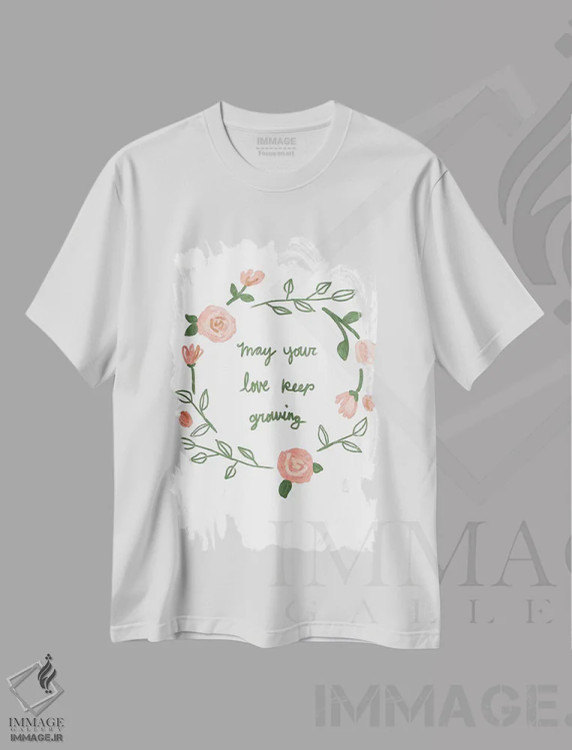 تیشرت سفید طرح دار عشق همچنان رشد می کند، تزئینی اثر جسیکا بروگینک | فروشگاه ایماژ
