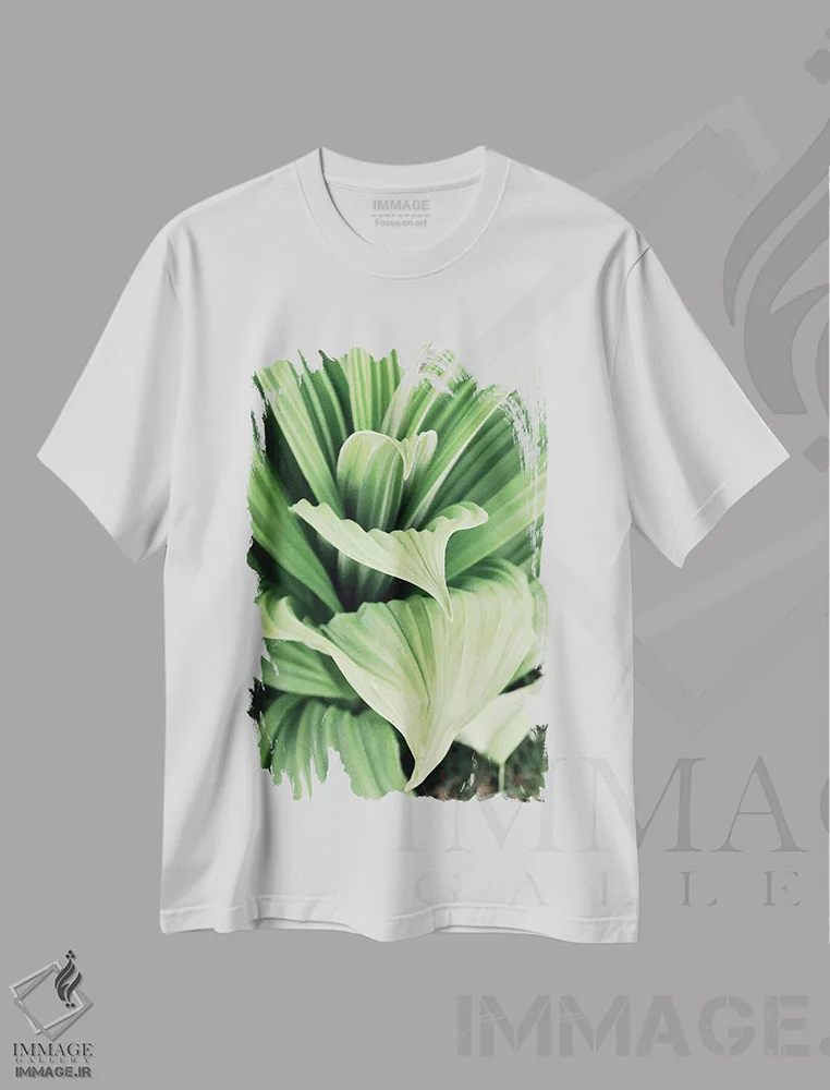 تیشرت سفید طرح دار شکوفه های برگ سبز ۱، مدیوم اثر کتی منسفیلد | immage.ir