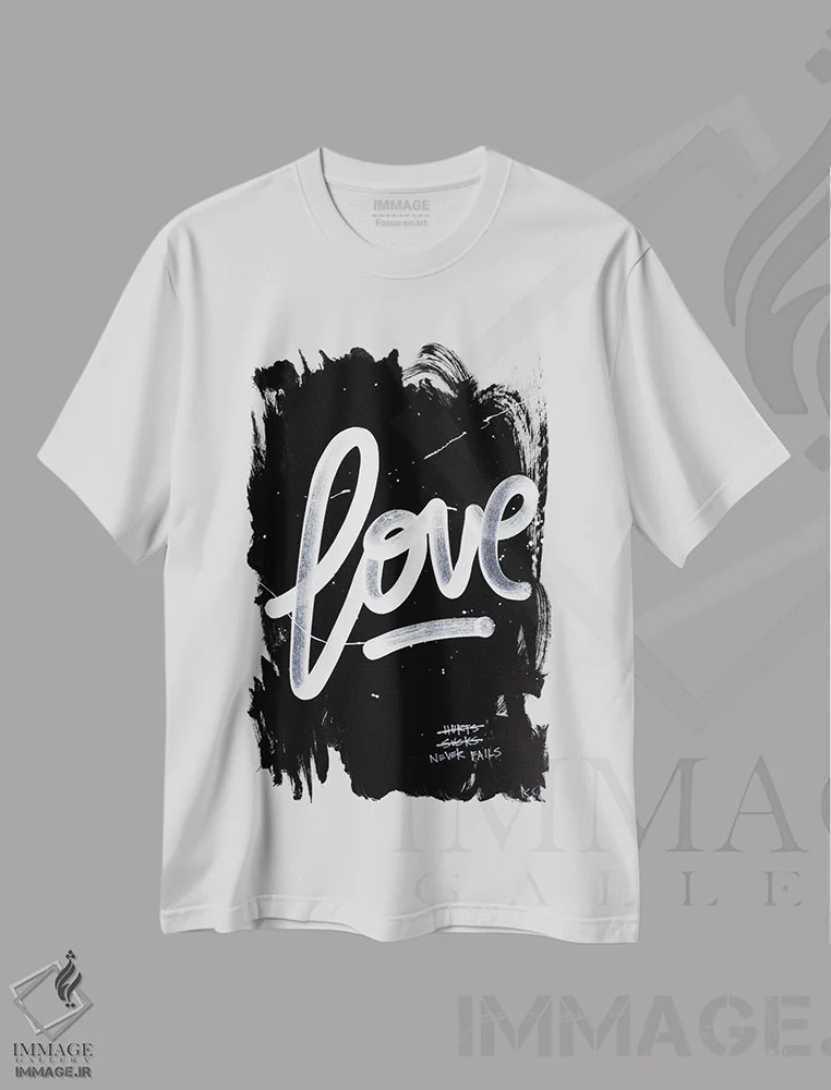 تیشرت سفید طرح دار عشق هرگز شکست نمی خورد، هنر تزئینی سیاه و سفید اثر کنت یانگستروم | فروشگاه ایماژ