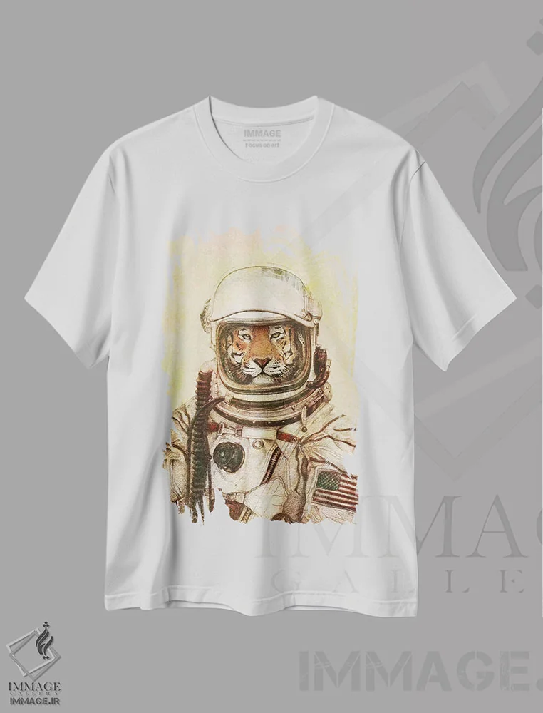 تیشرت سفید طرح دار – تیشرت طنز ,"آپولو " اثر مایک کوبو immage.ir