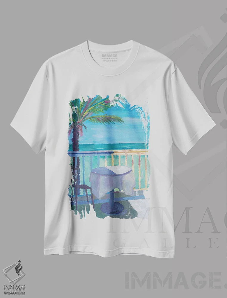 تیشرت سفید طرح دار – تیشرت ساحلی ,میز کافه با منظره دریا در کارائیب همراه با نخل اثر مارکوس و مارتینا بلیشنر immage.ir