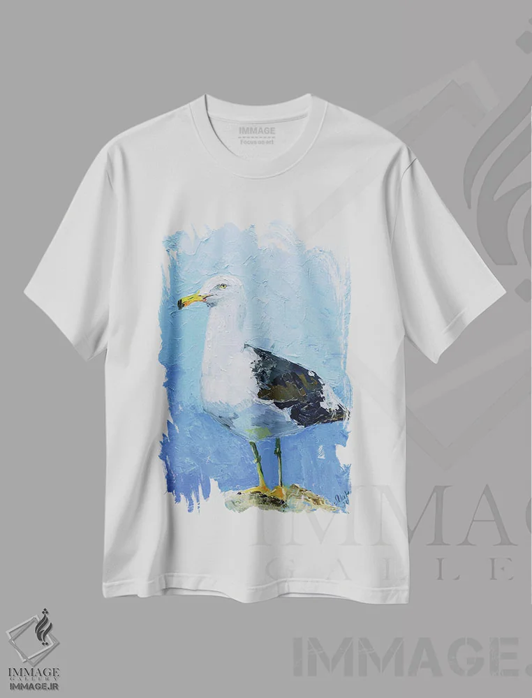 تیشرت سفید طرح دار مرغ دریایی II، دکور ساحلی اثر ناتالی مک | فروشگاه ایماژ