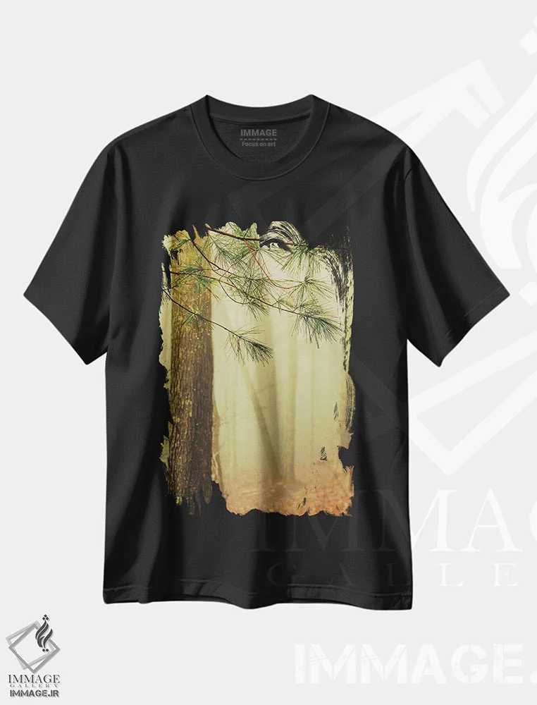 تیشرت مشکی طرح دار درختان در مه IV، مدیوم اثر اولیویا جوی سنت کلر | immage.ir