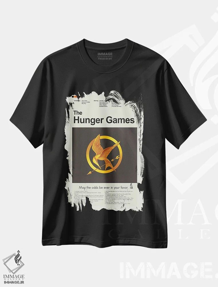 تیشرت مشکی طرح دار – تیشرت فیلم ,بازی های عطش اثر پرینتس اند گیگلز اثر اَرین هیگرمن فروشگاه ایماژ