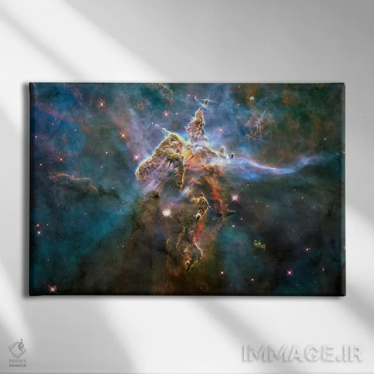 تابلو کوه مرموز در سحابی کارینا (تلسکوپ فضایی هابل) اثر ناسا (آژانس فضایی آمریکا) - نمای روبهرو روی دیوار
