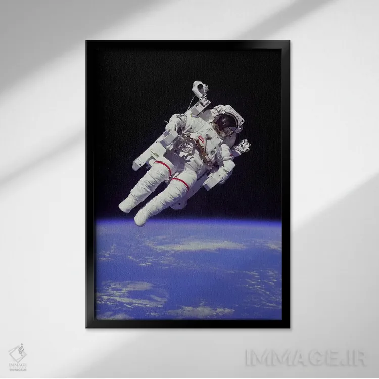 تابلو فضانورد ناسا اثر ناسا (آژانس فضایی آمریکا) - نمای قابدار مشکی