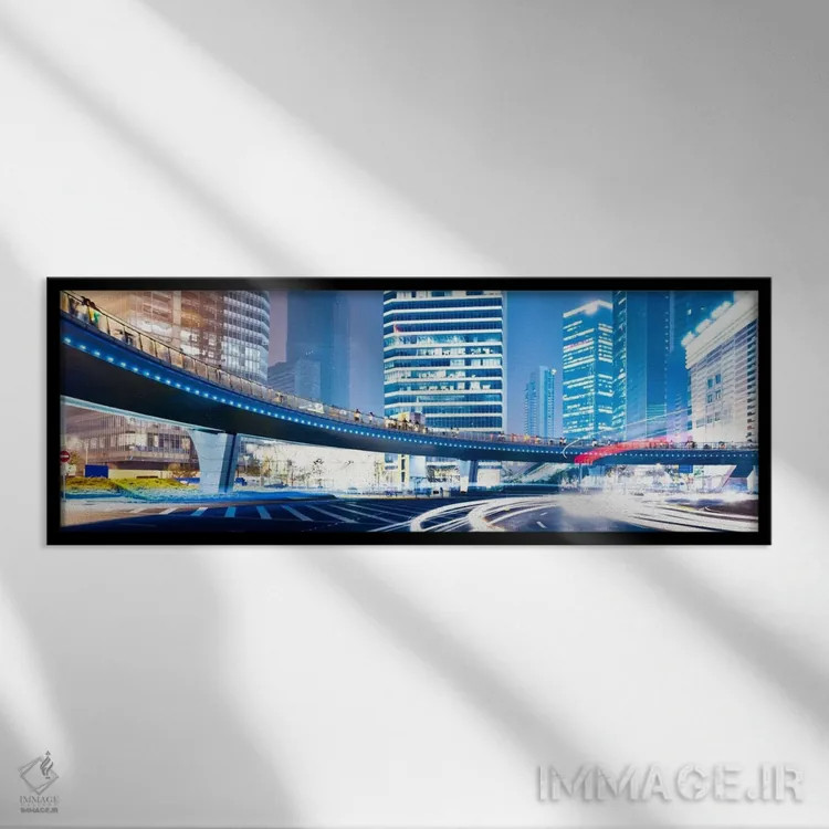 تابلو خیابانهای شبانه در شهر (نمای پانورامای آسماننما) اثر هنرمند ناشناس - نمای قابدار مشکی