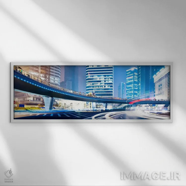 تابلو خیابانهای شبانه در شهر (نمای پانورامای آسماننما) اثر هنرمند ناشناس - نمای قابدار سفید