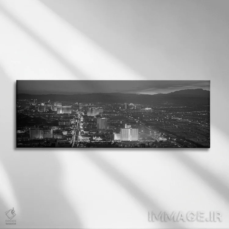 تابلو منظرهٔ گستردهٔ آسماننمای لاسوگاس (سیاه و سفید) اثر هنرمند ناشناس - نمای روبهرو روی دیوار