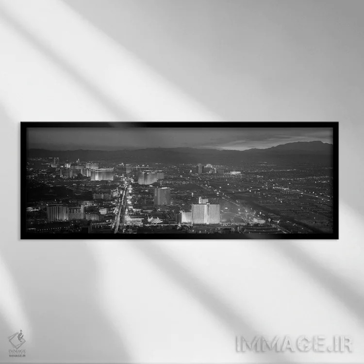 تابلو منظرهٔ گستردهٔ آسماننمای لاسوگاس (سیاه و سفید) اثر هنرمند ناشناس - نمای قابدار مشکی