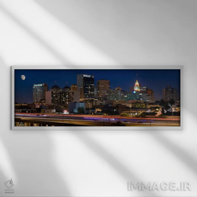 تابلو منظرهٔ گستردهٔ آسماننمای اوکلند (شب) اثر هنرمند ناشناس - نمای قابدار سفید