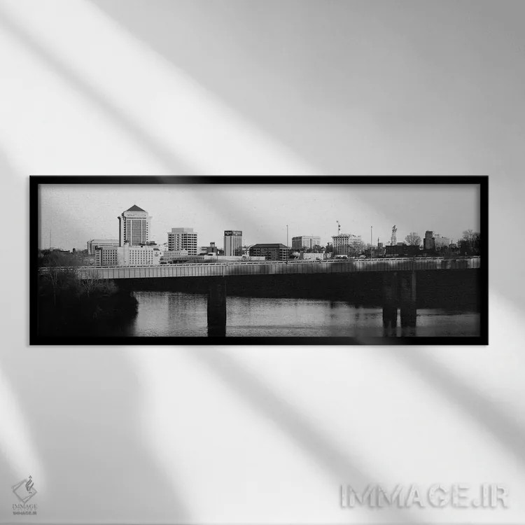 تابلو منظرهٔ گستردهٔ آسماننمای مونتگمری (سیاه و سفید) اثر هنرمند ناشناس - نمای قابدار مشکی