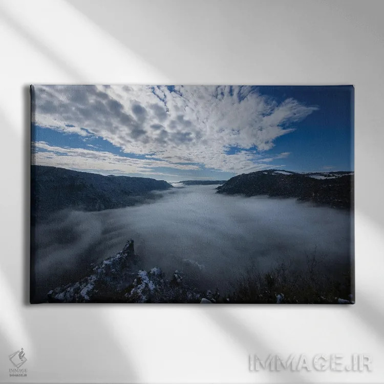 تابلو منظر زمستانی بر فراز دره اثر آنابل شابر - نمای روبهرو روی دیوار