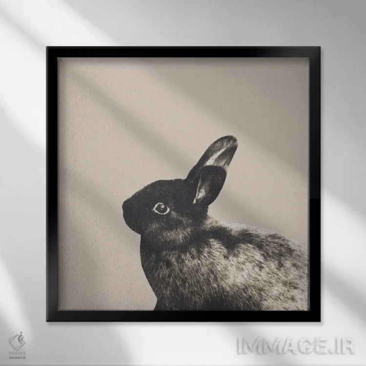 تابلو خرگوش کوچک روی بژ روشن I اثر هنر آنیتا و بلا - نمای قابدار مشکی
