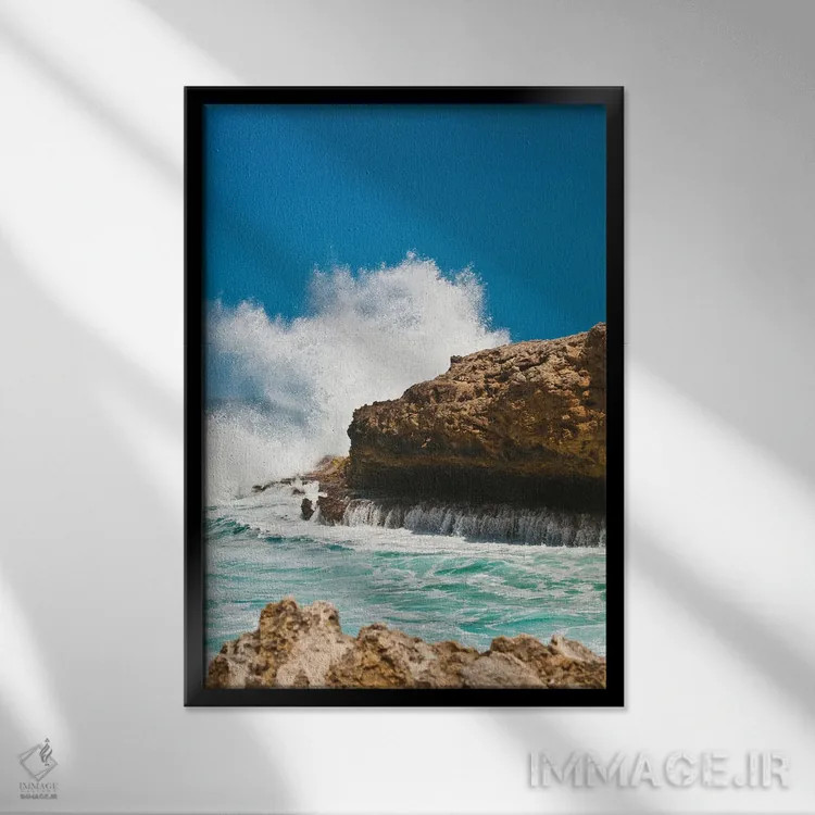 تابلو برخورد صخره مرجانی با امواج خروشان یکم اثر هنر آنیتا و بلا - نمای قابدار مشکی