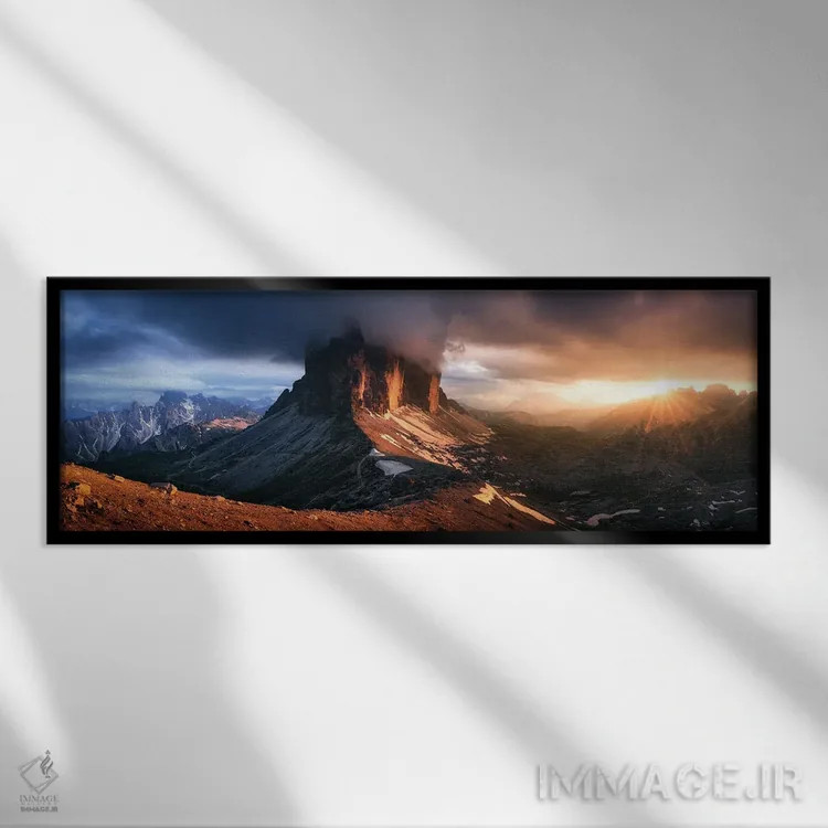 تابلو نور دراماتیک پس از باران در تره چیمه دی لاواردو (دولومیت) اثر دنیل گاستاگر - نمای قابدار مشکی