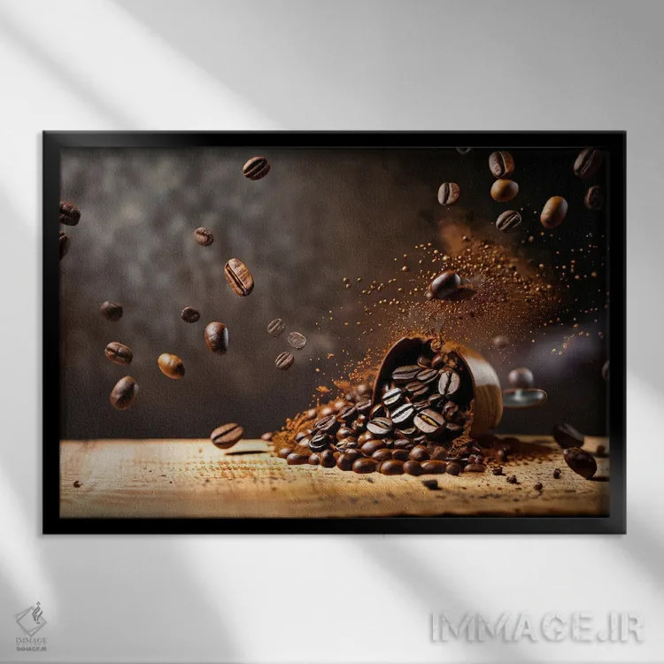 تابلو دانههای قهوه در حال پرواز و جهش بالای یک فنجان اثر آلساندرو دلا توره - نمای قابدار مشکی