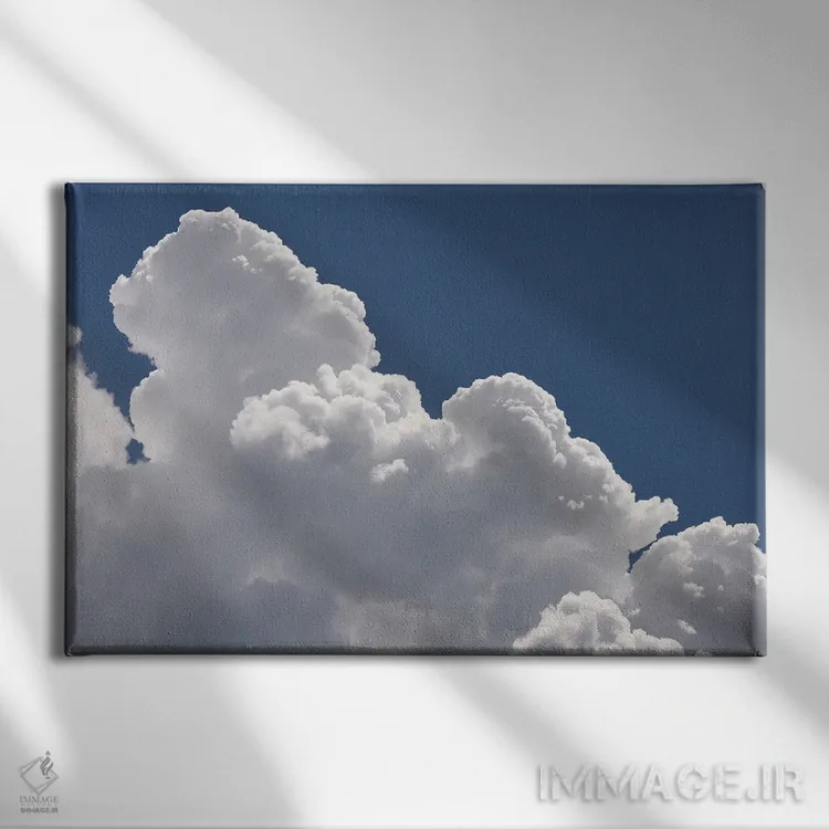 تابلو ابرهای سفید و آسمان آبی در یک روز آفتابی در میلان، ایتالیا اثر آلساندرو دلا توره - نمای روبهرو روی دیوار