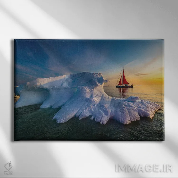 تابلو قایق بادبانی قرمز کنار کوه یخی گرینلند (قسمت دوم) اثر الکس جی پرز - نمای روبهرو روی دیوار