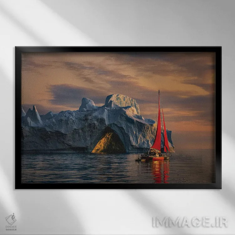 تابلو غروب قایق بادبانی قرمز کنار کوه یخی گرینلند (قسمت اول) اثر الکس جی پرز - نمای قابدار مشکی