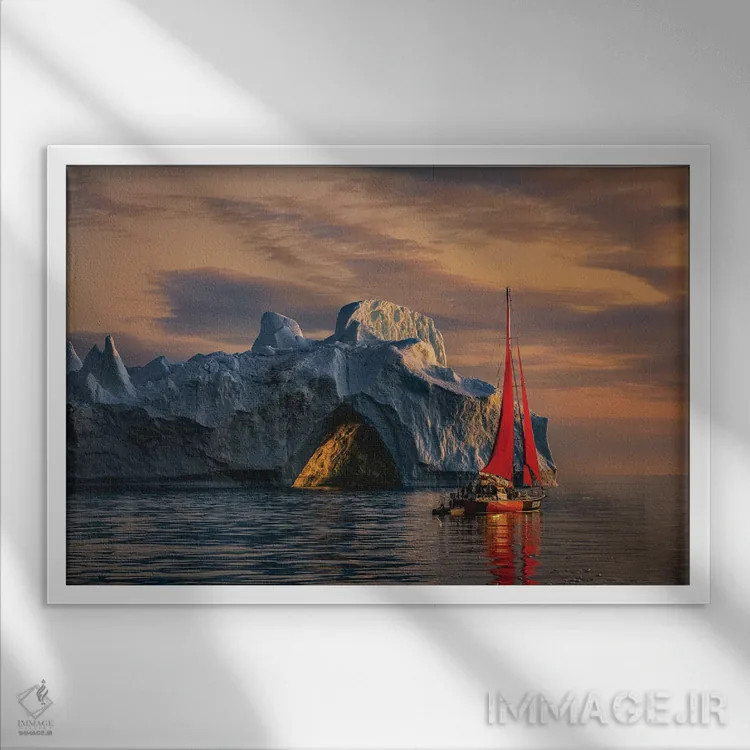 تابلو غروب قایق بادبانی قرمز کنار کوه یخی گرینلند (قسمت اول) اثر الکس جی پرز - نمای قابدار سفید