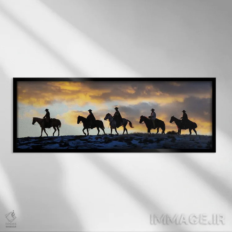 تابلو Shell, Wyoming Hideout Ranch Cowboys And Cowgirls Silhouetted Against Sunset Riding On Ridgeline II,آمریکا، شل، وایومینگ، کابویها و کابوی دختران در حال سواری سیلوئتشده مقابل غروب بر خطالرأس ۲ اثر دارل گالین - نمای قابدار مشکی