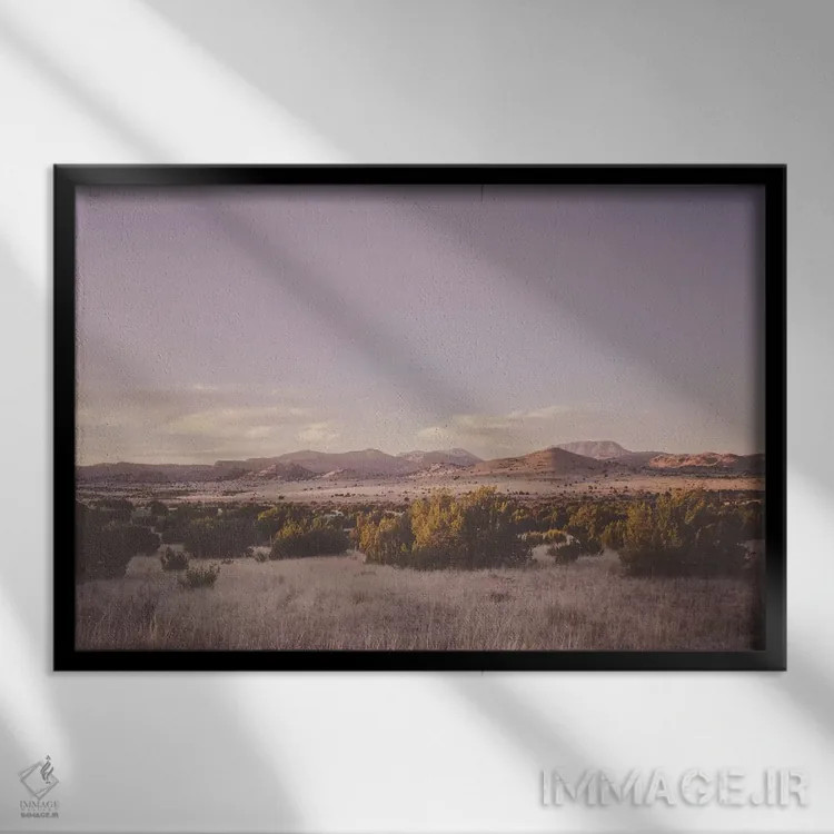 تابلو غروب بیابان اثر آن هادک - نمای قابدار مشکی