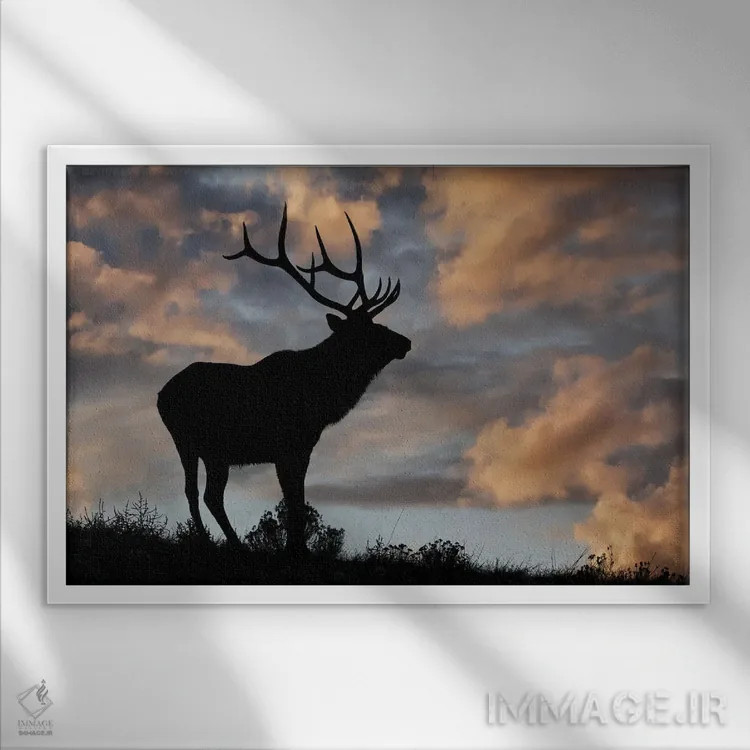 تابلو سیلوئت گوزن نر یا واپیتی هنگام طلوع روی خطالرأس، پارک ملی یلوستون، وایومینگ اثر آدام جونز - نمای قابدار سفید