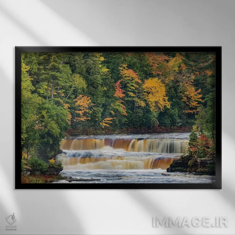 تابلو آبشار پلکانی در آبشار تاکوامنون در پاییز، پارک ایالتی آبشار تاکوامنون، میشیگان اثر آدام جونز - نمای قابدار مشکی