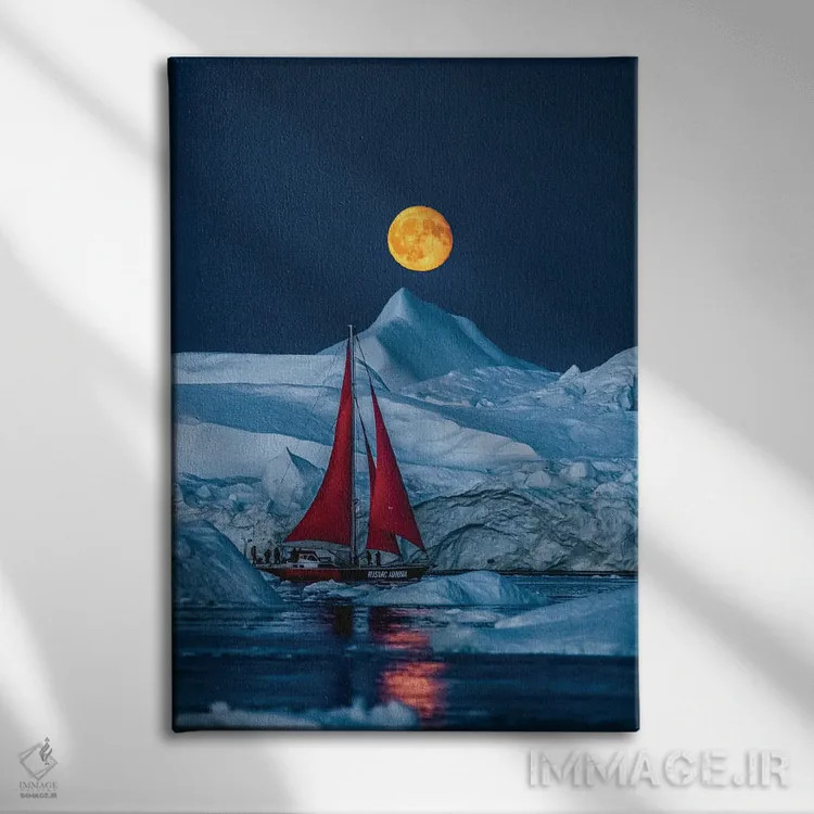 تابلو قایق بادبانی قرمز کنار کوه یخی گرینلند با ماه کامل اثر الکس جی پرز - نمای روبهرو روی دیوار