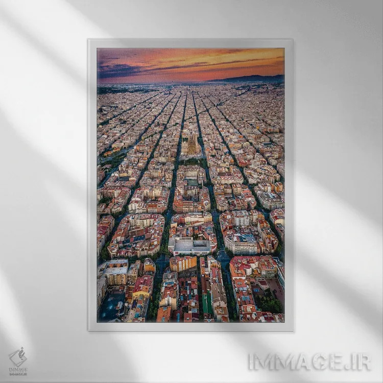 تابلو غروب شهر بارسلونا اسپانیا از بالا (الگوی شبکهای شهری) اثر الکس جی پرز - نمای قابدار سفید