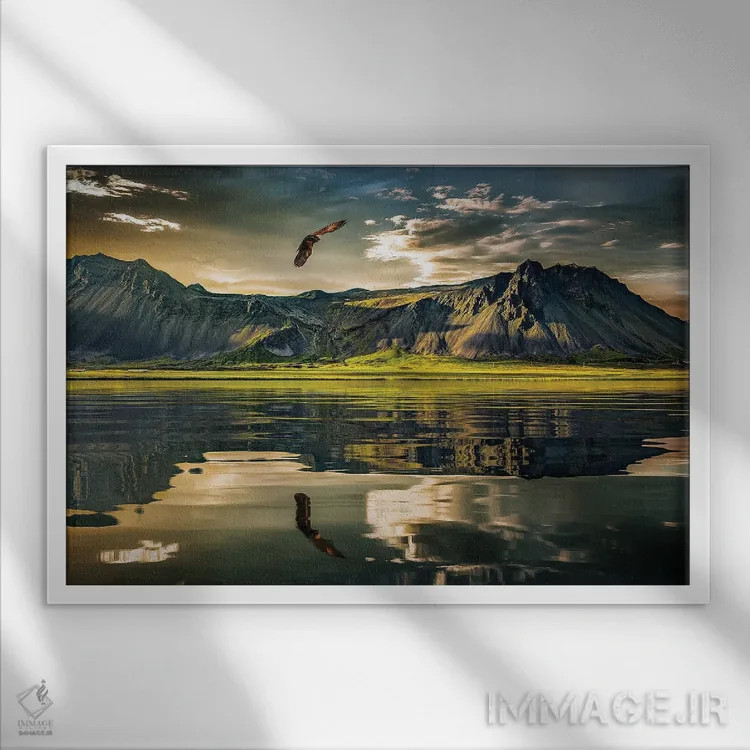 تابلو عقاب در طبیعت و بازتاب کوهها در دریاچه اثر آدریان ویریو - نمای قابدار سفید