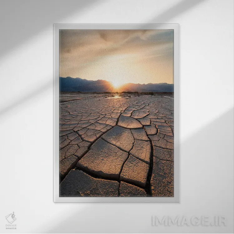 تابلو غروب خورشید پشت ترکهای گل پیچیدهٔ درهی مرگ اثر الکساندر اسلاوتسکی - نمای قابدار سفید