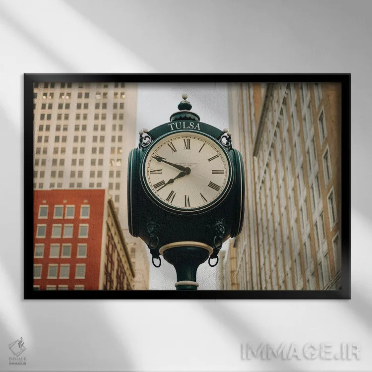 تابلو ساعت صدمین سال تولسا II اثر جان بیلوس - نمای قابدار مشکی