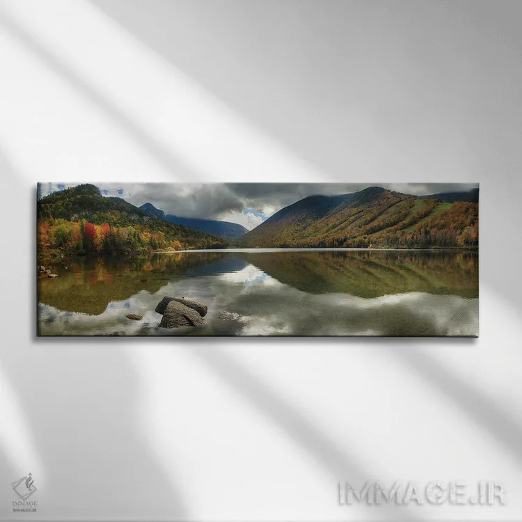 تابلو نمای پانوراما از دریاچه آرام کوهستانی در پاییز، دریاچه اکو، فرانکونیا، نیوهمپشایر اثر جورج اوزه - نمای روبهرو روی دیوار