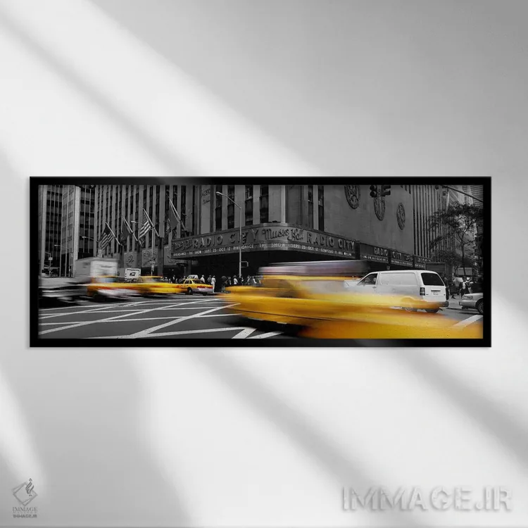 تابلو Radio City Music Hall, New York City, New York State, USA Color Pop,ماشینها جلوی ساختمان سالن موسیقی رادیو سیتی نیویورک آمریکا با رنگ تقویتی اثر پانورامیک ایمجز (استودیو عکاسی عریض) - نمای قابدار مشکی