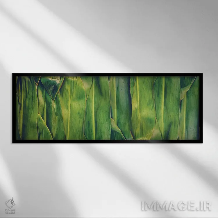 تابلو پسزمینهٔ برگ موز با طیف سبز-زرد اثر ایوجنیا بیدیوک - نمای قابدار مشکی