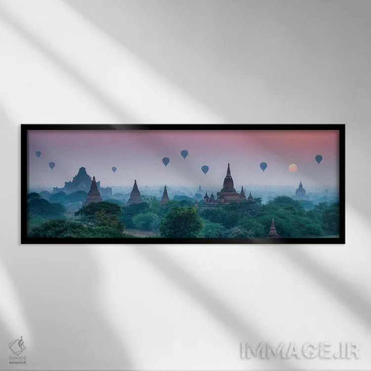 تابلو Bagan, Myanmar,معبدهای قدیمی با بالنهای هوای گرم در طلوع خورشید، باگان، میانمار اثر یان بکه - نمای قابدار مشکی