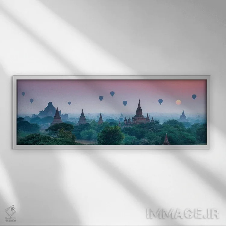 تابلو Bagan, Myanmar,معبدهای قدیمی با بالنهای هوای گرم در طلوع خورشید، باگان، میانمار اثر یان بکه - نمای قابدار سفید