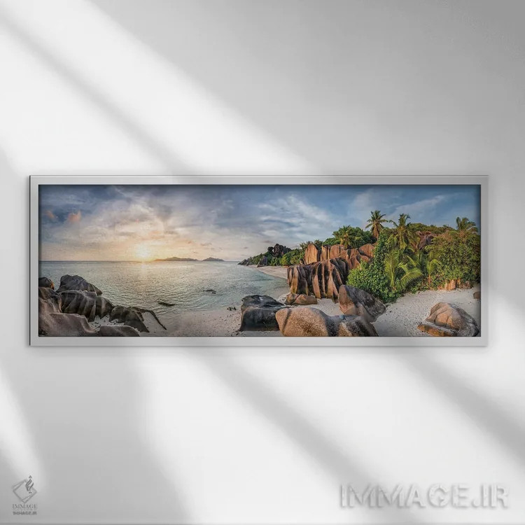 تابلو La Digue, Seychelles,نمای پانورامای غروب در ساحل آنسه سورس دارژان، لا دیگ، سیشل اثر یان بکه - نمای قابدار سفید
