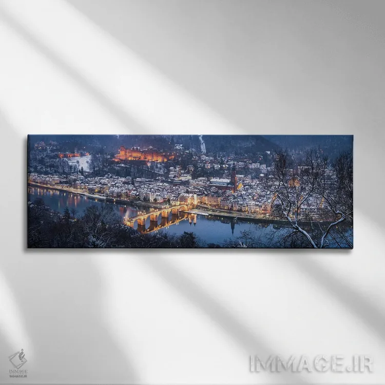 تابلو منظره پانورامای شهر قدیمی هایدلبرگ در زمستان با منظره پل قدیمی و قلعه اثر یان بکه - نمای روبهرو روی دیوار