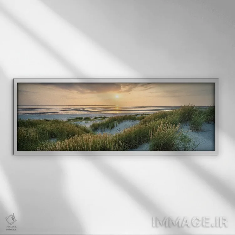 تابلو منظره پانورامای زیبای ساحل تپه شنی در غروب با نور گرم عصرگاهی اثر یان بکه - نمای قابدار سفید